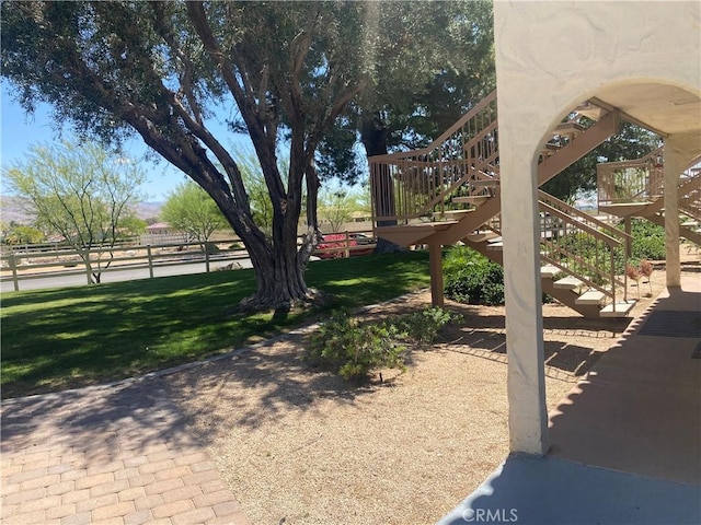 view of yard featuring stairway