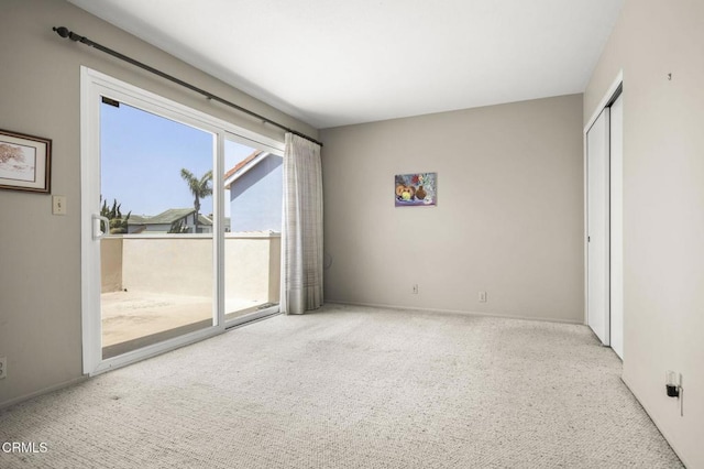2120 Jamestown Way, Oxnard, CA 93035 - unfurnished bedroom with access to outside, carpet flooring, baseboards, and a closet
