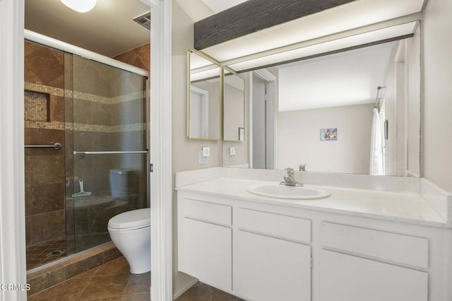 2120 Jamestown Way, Oxnard, CA 93035 - full bath featuring toilet, vanity, a shower stall, and tile patterned flooring