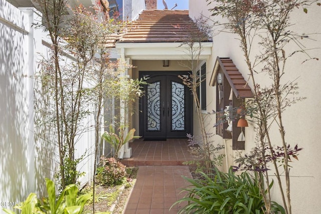 2120 Jamestown Way, Oxnard, CA 93035 - property entrance featuring stucco siding, a tile roof, and french doors