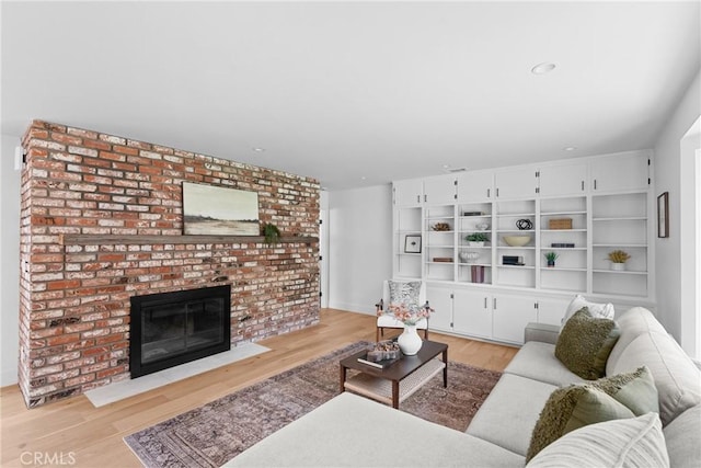 1804 Deer Canyon Rd, Arroyo Grande, CA 93420 - living area with light wood-style floors, a brick fireplace, and recessed lighting