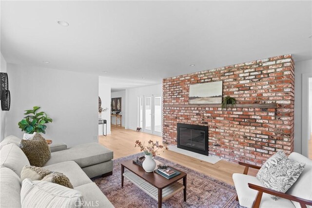 1804 Deer Canyon Rd, Arroyo Grande, CA 93420 - living room featuring wood finished floors, a fireplace, and recessed lighting