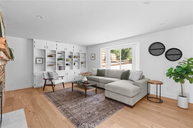 1804 Deer Canyon Rd, Arroyo Grande, CA 93420 - living area with light wood finished floors, baseboards, a fireplace with flush hearth, and recessed lighting