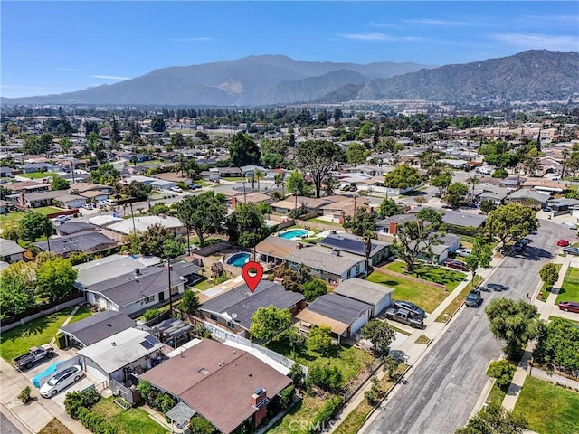 6109 N Traymore Ave, Azusa, CA 91702 - aerial perspective of suburban area featuring a mountainous background