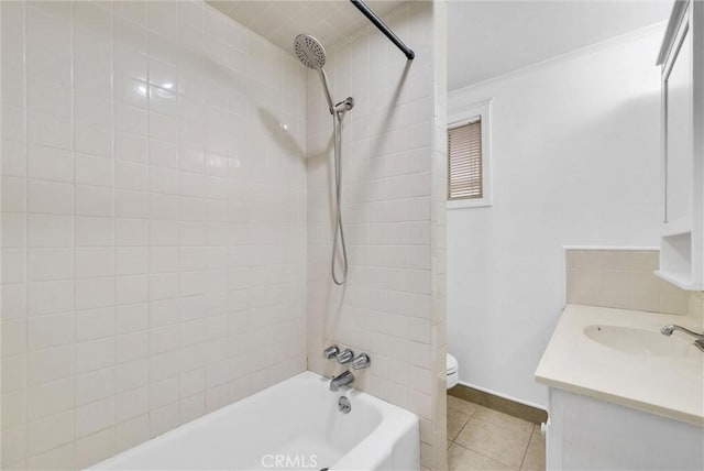 6109 N Traymore Ave, Azusa, CA 91702 - bathroom with crown molding, shower / washtub combination, toilet, tile patterned flooring, and vanity