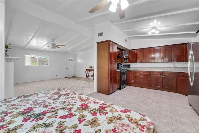 6109 N Traymore Ave, Azusa, CA 91702 - kitchen with ceiling fan, stainless steel appliances, light tile patterned floors, and light stone countertops