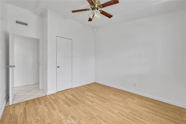6109 N Traymore Ave, Azusa, CA 91702 - unfurnished bedroom with crown molding, light wood finished floors, baseboards, and ceiling fan