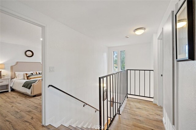 128 Fairview St Unit 1, Santa Ana, CA 92704 - hall with an upstairs landing and light wood finished floors