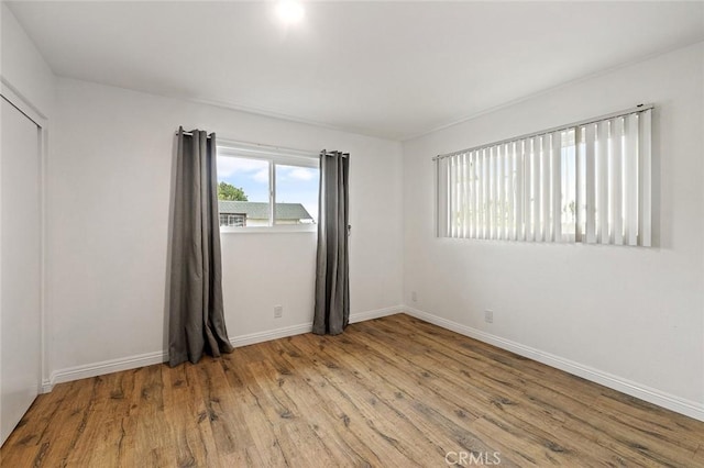 128 Fairview St Unit 1, Santa Ana, CA 92704 - spare room with wood finished floors and baseboards