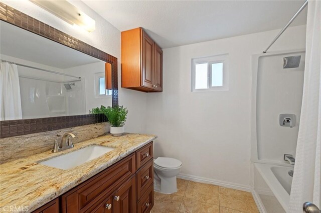 128 Fairview St Unit 1, Santa Ana, CA 92704 - bathroom with toilet, vanity, baseboards, shower / tub combo, and tile patterned floors