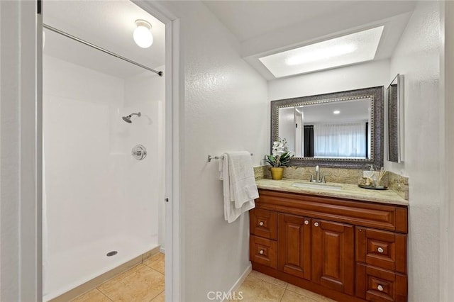 128 Fairview St Unit 1, Santa Ana, CA 92704 - full bath with tile patterned flooring, a shower, vanity, and baseboards