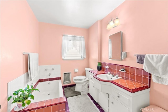 10608 Beak Ave, South Gate, CA 90280 - full bathroom featuring toilet, a garden tub, vanity, and backsplash