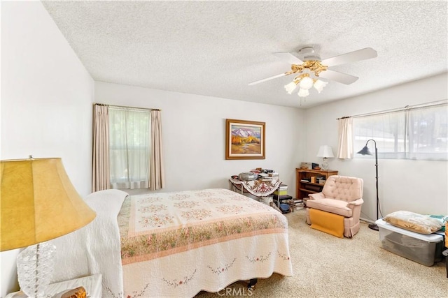 10608 Beak Ave, South Gate, CA 90280 - bedroom featuring a textured ceiling, carpet, and ceiling fan