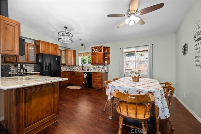 7525 Starlight Way, Julian, CA 92036 - kitchen with black appliances, brown cabinets, tasteful backsplash, open shelves, and glass insert cabinets