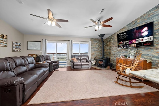 7525 Starlight Way, Julian, CA 92036 - living area with a wood stove, ceiling fan, lofted ceiling, and wood finished floors