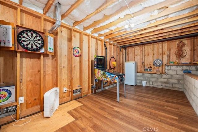 7525 Starlight Way, Julian, CA 92036 - unfinished basement featuring freestanding refrigerator and wood finished floors