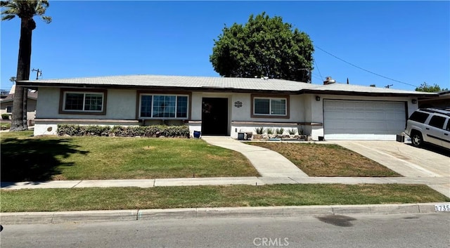 17354 Athol St, Fontana, CA 92335 - ranch-style house featuring stucco siding, an attached garage, a front lawn, and driveway