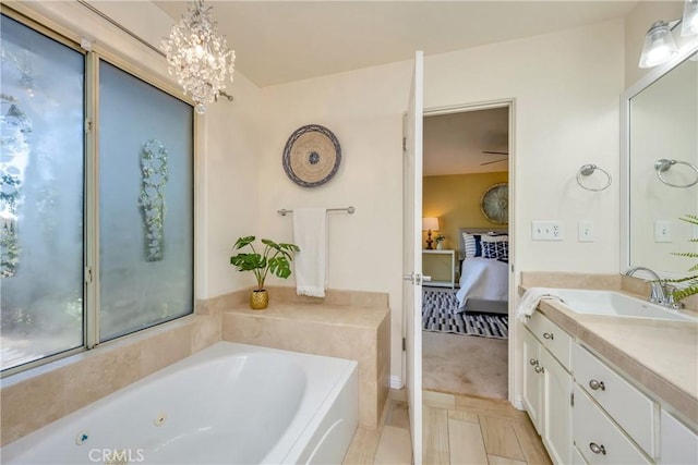 15632 Little Peak Rd, Hidden Valley Lake, CA 95467 - bathroom with ensuite bath, a bath, vanity, and a chandelier