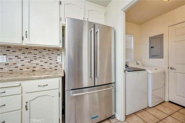 15632 Little Peak Rd, Hidden Valley Lake, CA 95467 - kitchen with freestanding refrigerator, electric panel, washer and clothes dryer, white cabinets, and light tile patterned floors