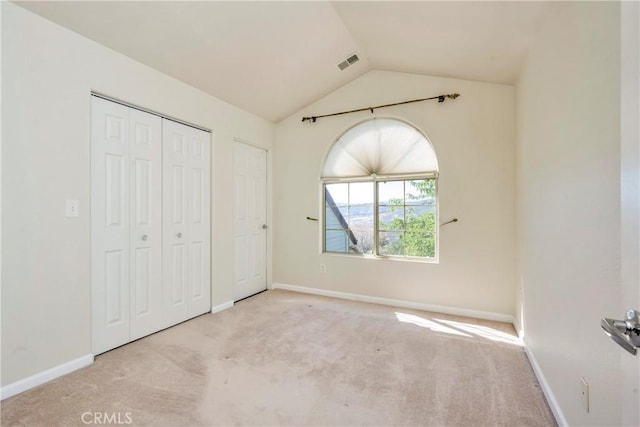 15632 Little Peak Rd, Hidden Valley Lake, CA 95467 - unfurnished bedroom featuring carpet flooring, lofted ceiling, and baseboards