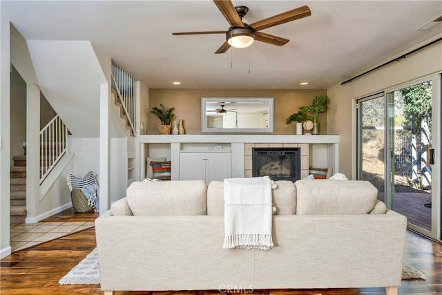 15632 Little Peak Rd, Hidden Valley Lake, CA 95467 - living room with ceiling fan, stairway, wood finished floors, a tile fireplace, and recessed lighting