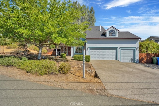 15632 Little Peak Rd, Hidden Valley Lake, CA 95467 - view of front of property with an attached garage, driveway, and a shingled roof