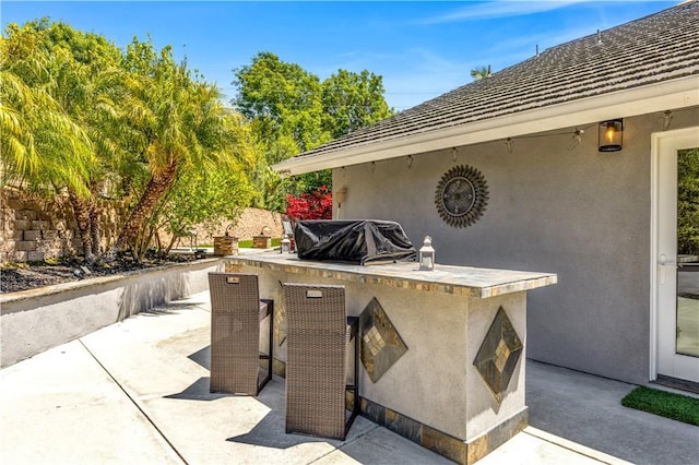22602 Manalastas Dr, Lake Forest, CA 92630 - view of patio / terrace featuring grilling area and an outdoor kitchen
