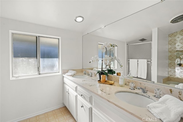 5932 Ellenview Ave, Woodland Hills, CA 91367 - bathroom featuring a stall shower, tile patterned floors, double vanity, and baseboards