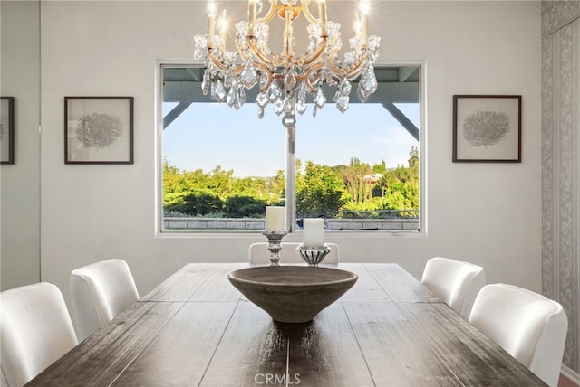 5932 Ellenview Ave, Woodland Hills, CA 91367 - dining space featuring a chandelier