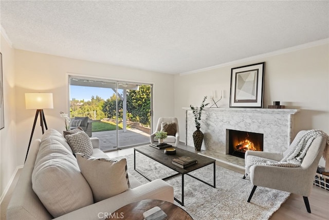 5932 Ellenview Ave, Woodland Hills, CA 91367 - living area with wood finished floors, a premium fireplace, ornamental molding, a textured ceiling, and baseboards