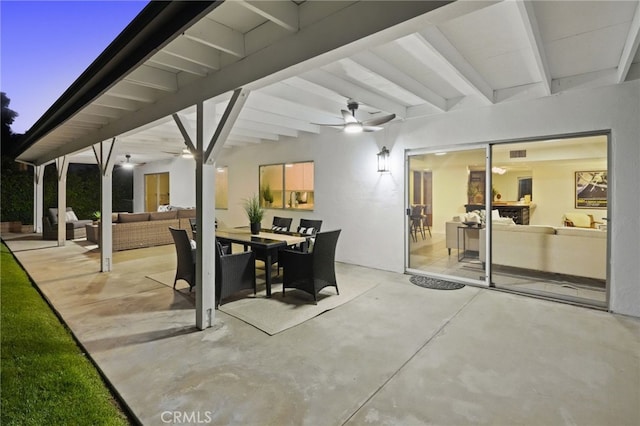 5932 Ellenview Ave, Woodland Hills, CA 91367 - patio terrace at dusk with an outdoor hangout area, a ceiling fan, and outdoor dining area