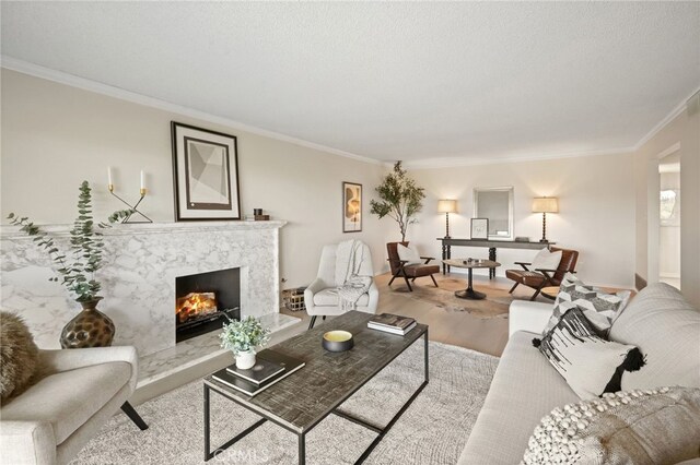 5932 Ellenview Ave, Woodland Hills, CA 91367 - living area featuring a high end fireplace, crown molding, wood finished floors, and baseboards