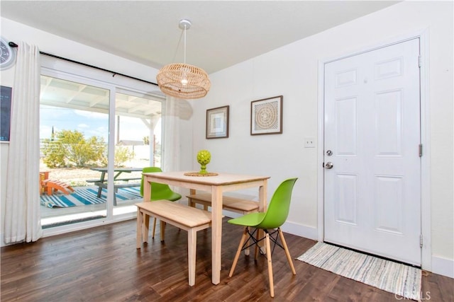 3872 Balsa Ave, Yucca Valley, CA 92284 - dining space with dark wood-type flooring and baseboards