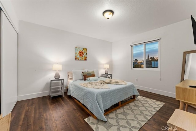 3872 Balsa Ave, Yucca Valley, CA 92284 - bedroom featuring baseboards and wood finished floors