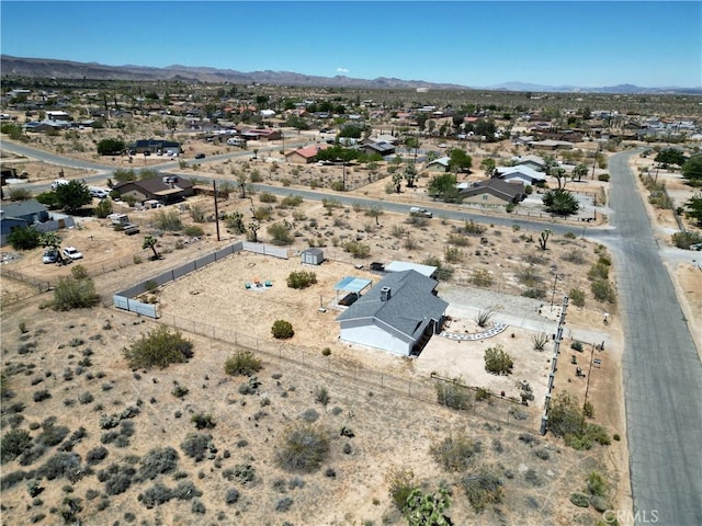 3872 Balsa Ave, Yucca Valley, CA 92284 - aerial view of residential area with mountains and a desert landscape
