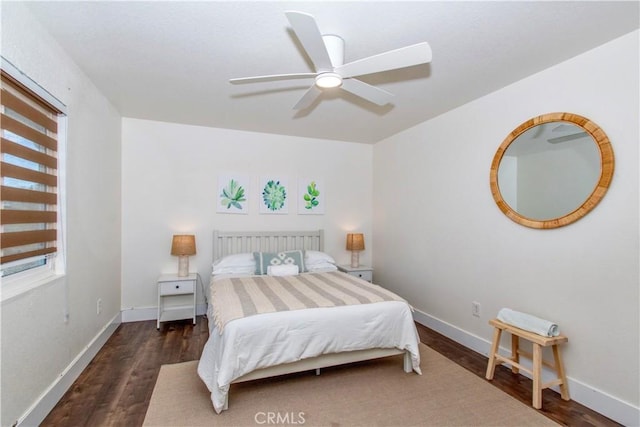 3872 Balsa Ave, Yucca Valley, CA 92284 - bedroom with dark wood-style floors, baseboards, and a ceiling fan