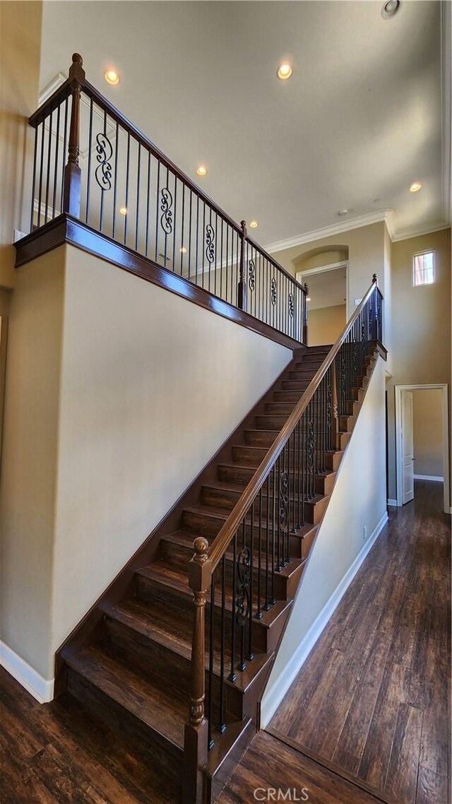 31820 Paseo Tarazona, San Juan Capistrano, CA 92675 - staircase with baseboards, crown molding, wood-type flooring, and recessed lighting