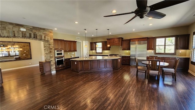 31820 Paseo Tarazona, San Juan Capistrano, CA 92675 - kitchen with appliances with stainless steel finishes, dark wood-type flooring, backsplash, a ceiling fan, and recessed lighting