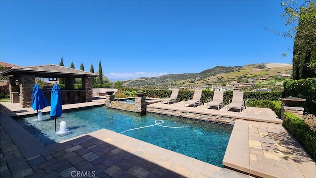 31820 Paseo Tarazona, San Juan Capistrano, CA 92675 - view of pool featuring a mountain view, a gazebo, a patio, and a pool with connected hot tub