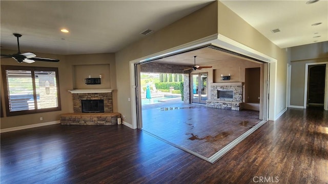 31820 Paseo Tarazona, San Juan Capistrano, CA 92675 - unfurnished living room with a stone fireplace, ceiling fan, wood finished floors, and recessed lighting