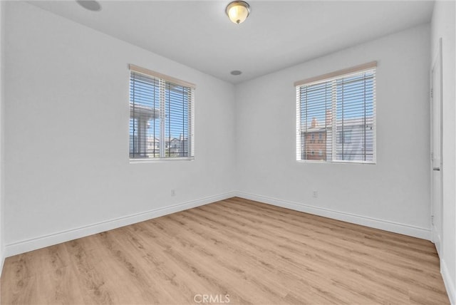 12455 Benton Dr Unit 2, Rancho Cucamonga, CA 91739 - empty room with wood finished floors and baseboards