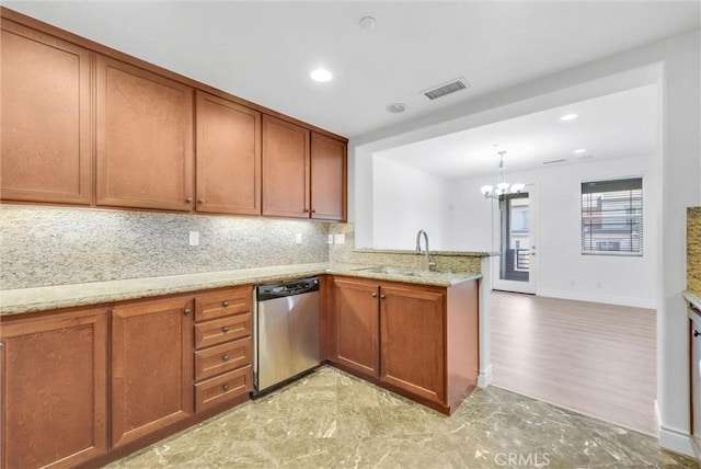 12455 Benton Dr Unit 2, Rancho Cucamonga, CA 91739 - kitchen with dishwasher, a sink, a chandelier, brown cabinetry, and a peninsula