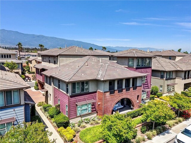 12455 Benton Dr Unit 2, Rancho Cucamonga, CA 91739 - view of front facade with a residential view, a mountain view, and stucco siding