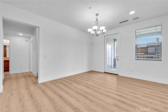 12455 Benton Dr Unit 2, Rancho Cucamonga, CA 91739 - empty room featuring a chandelier, light wood-style floors, baseboards, and recessed lighting
