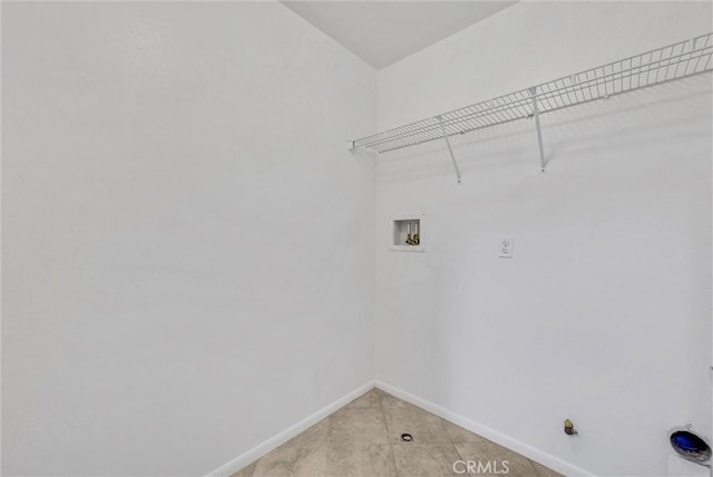 12455 Benton Dr Unit 2, Rancho Cucamonga, CA 91739 - washroom with washer hookup, baseboards, and light tile patterned flooring