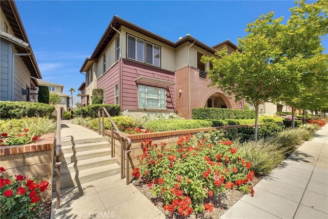 12455 Benton Dr Unit 2, Rancho Cucamonga, CA 91739 - view of front facade featuring stucco siding