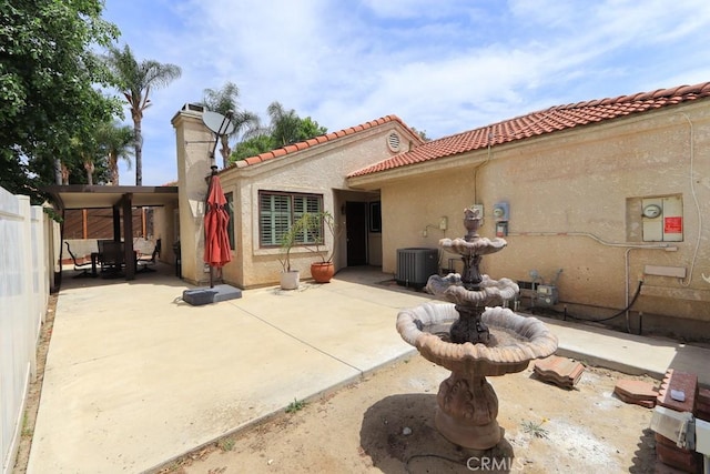 10260 Santa Rosa Ct, Rancho Cucamonga, CA 91730 - back of property with stucco siding, a patio, a chimney, and a tile roof