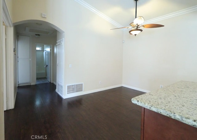 10260 Santa Rosa Ct, Rancho Cucamonga, CA 91730 - unfurnished dining area featuring a ceiling fan, arched walkways, dark wood finished floors, and ornamental molding