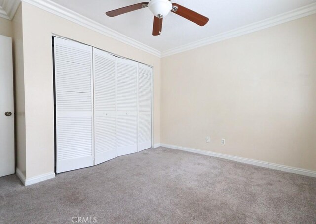10260 Santa Rosa Ct, Rancho Cucamonga, CA 91730 - unfurnished bedroom featuring carpet flooring, crown molding, a closet, and a ceiling fan
