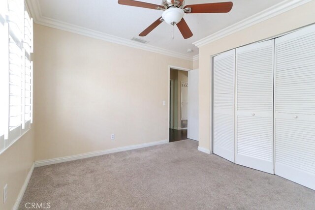 10260 Santa Rosa Ct, Rancho Cucamonga, CA 91730 - unfurnished bedroom featuring carpet flooring, ornamental molding, a closet, and ceiling fan